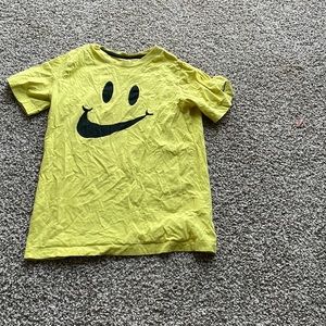 Yellow Nike smile tee